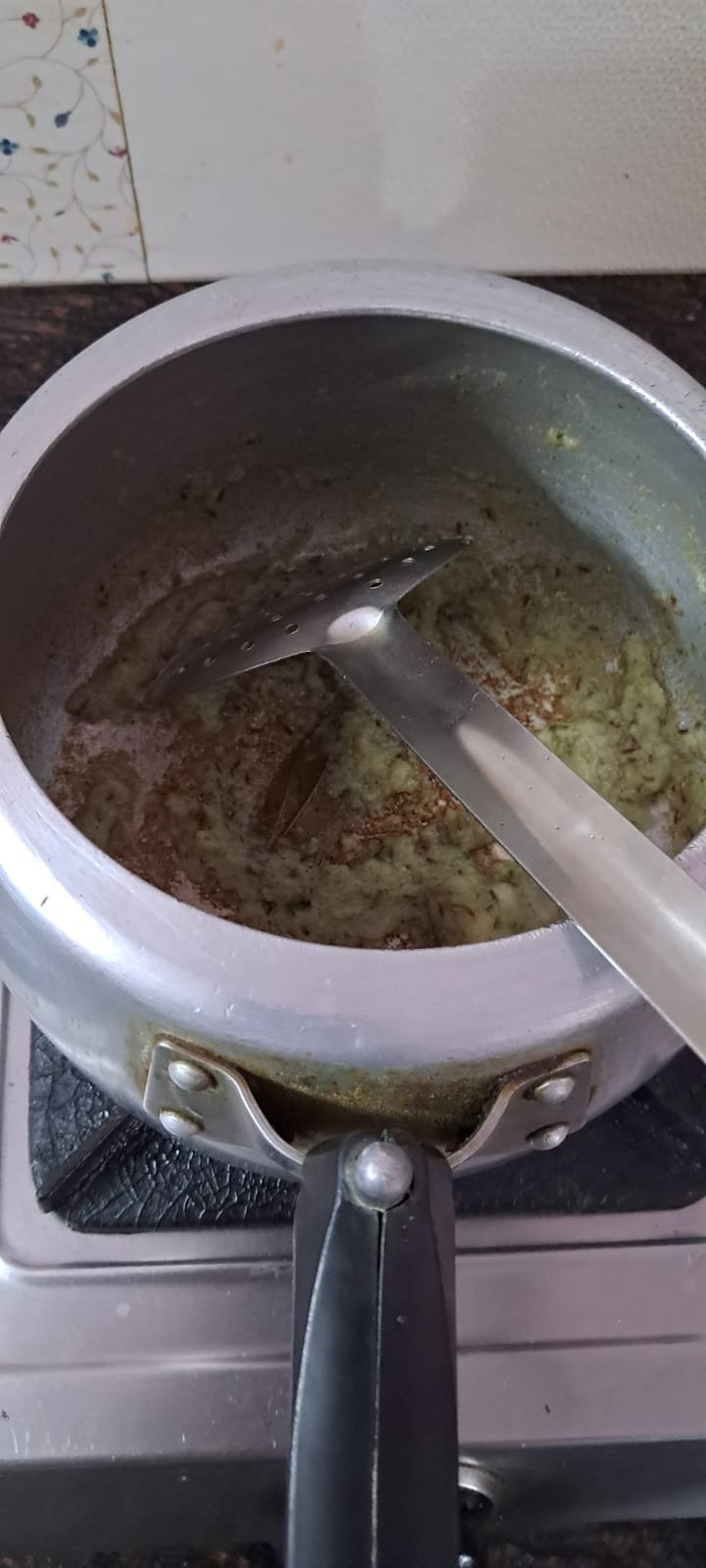 Ginger, Garlic, Onion and Mint leaves past starts to stick at bottom.